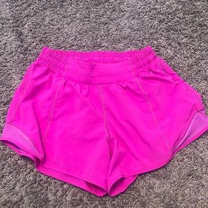 Pink Lululemon shorts size 4 never been worn.